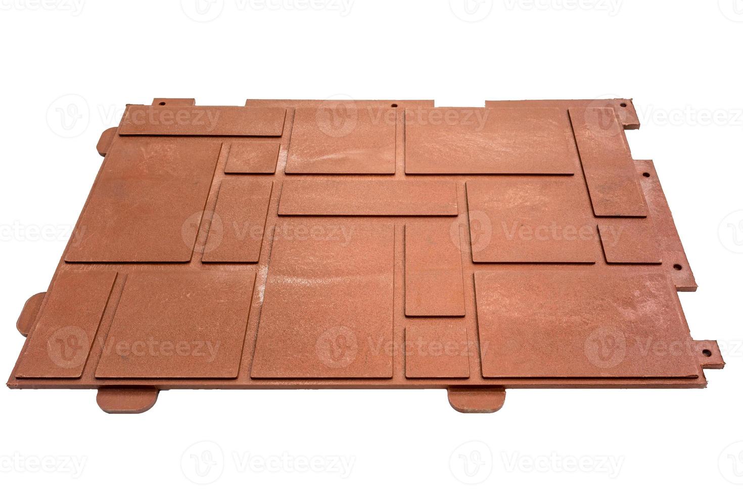 eco-parking paving slabs made of recycled plastic waste isolated on white background photo