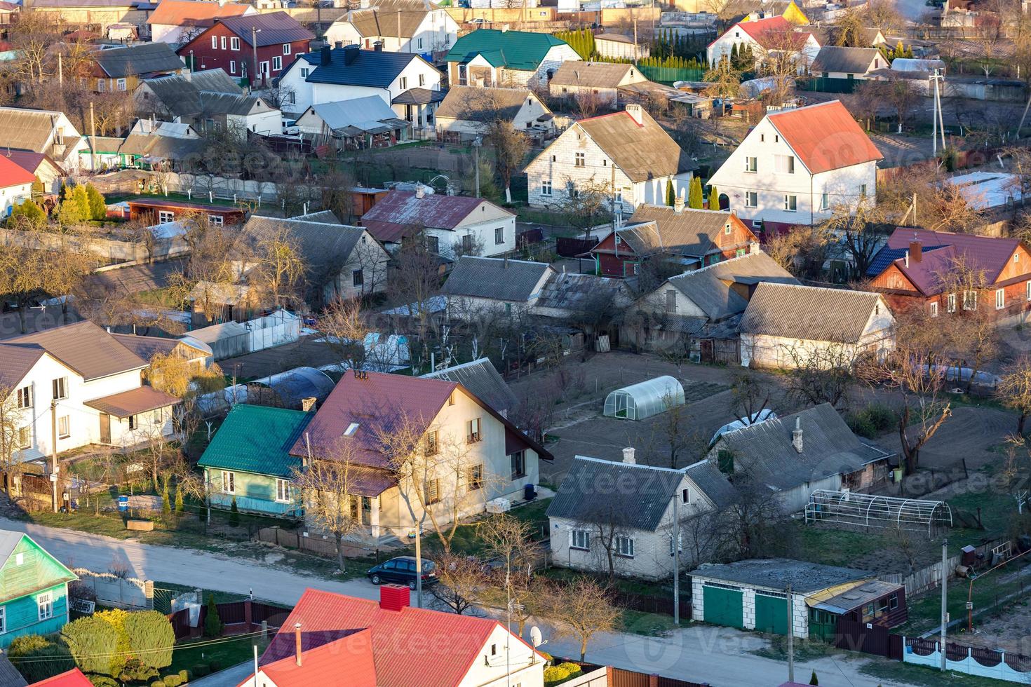 Panoramic view on village building area urban development residential quarter in the evening from a bird's eye view photo