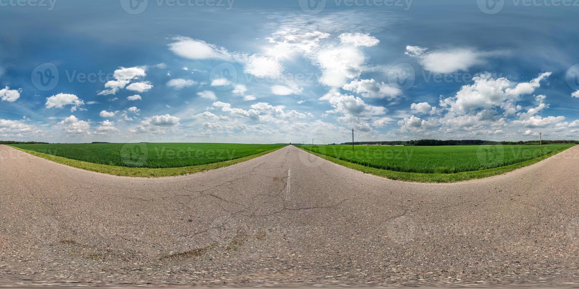 full seamless spherical hdri panorama 360 degrees angle view on asphalt road among fields in summer day with awesome clouds in equirectangular projection, ready for VR AR virtual reality content photo