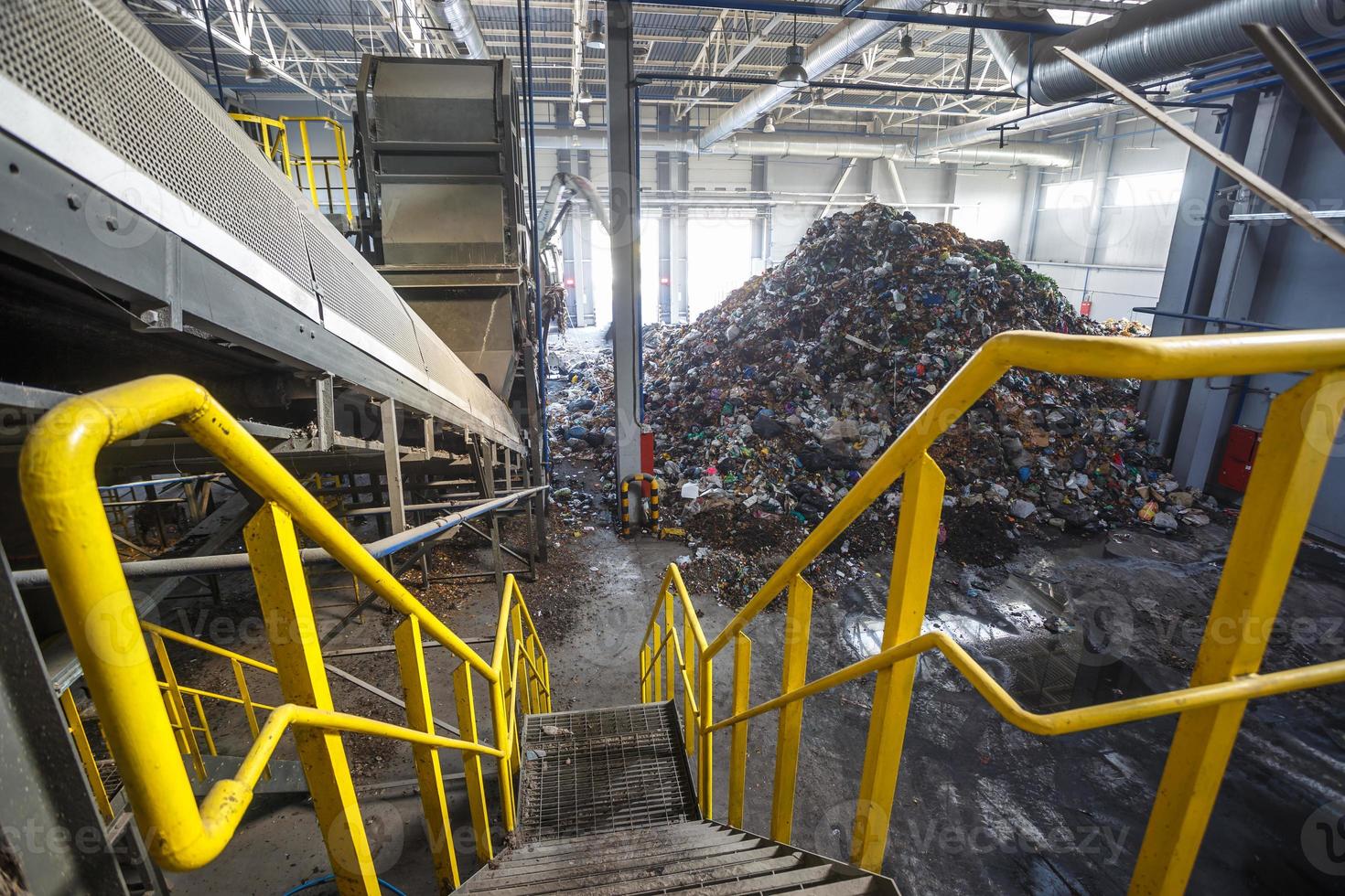 metal truss structures on modern waste recycling processing plant. Separate garbage collection. Recycling and storage of waste for further disposal. photo