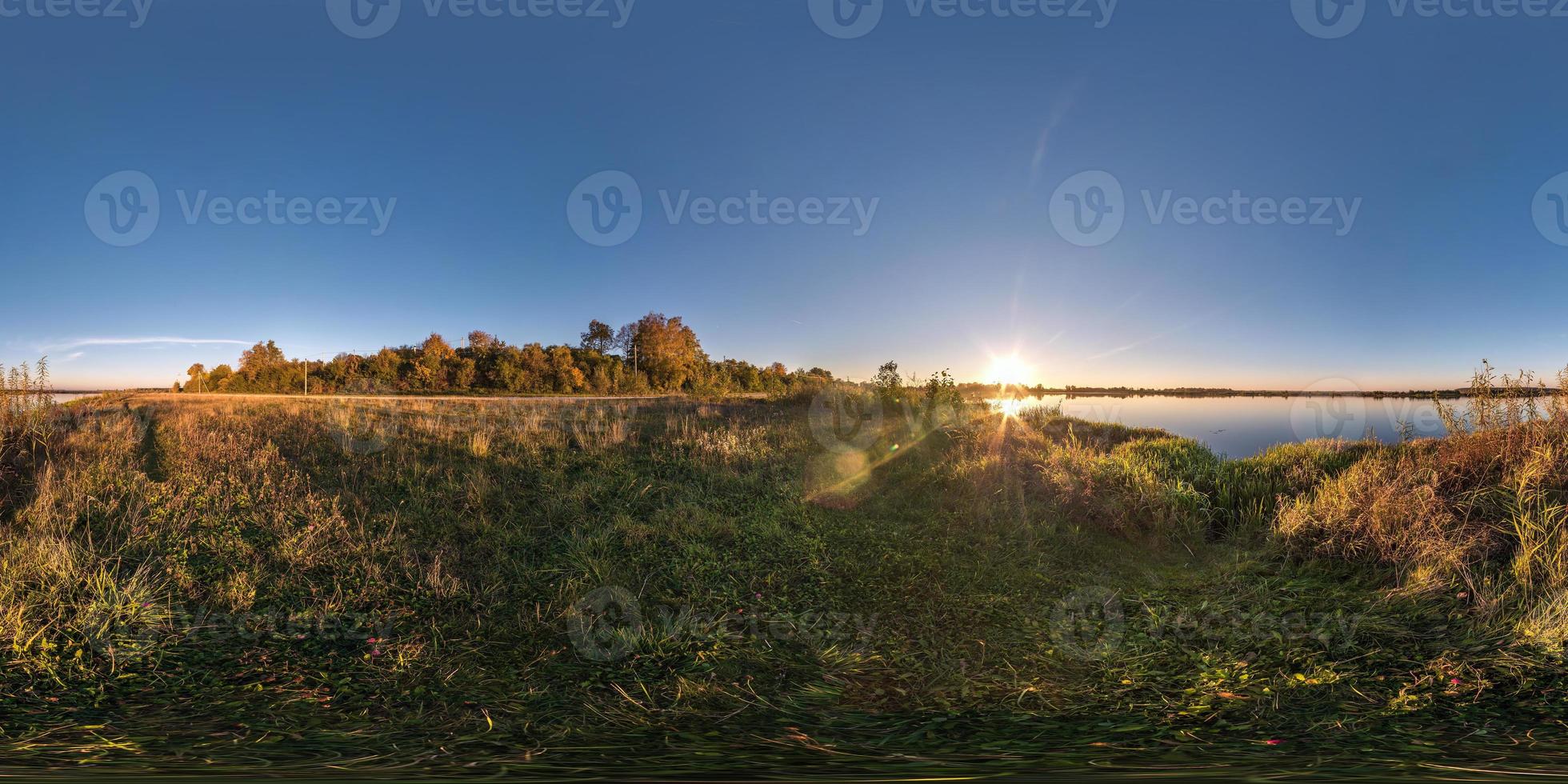 full seamless spherical cube panorama 360 degrees angle view on the shore of wide river neman in sunny summer evening sunset in equirectangular projection, ready for AR VR virtual reality content photo