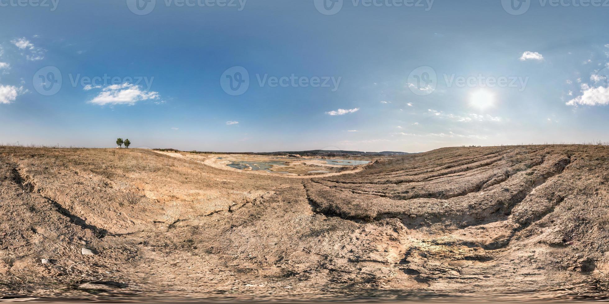 full seamless hdri panorama 360 degrees angle view near quarry flooded with water for sand extraction mining in the evening sun in equirectangular spherical equidistant projection for VR AR content photo