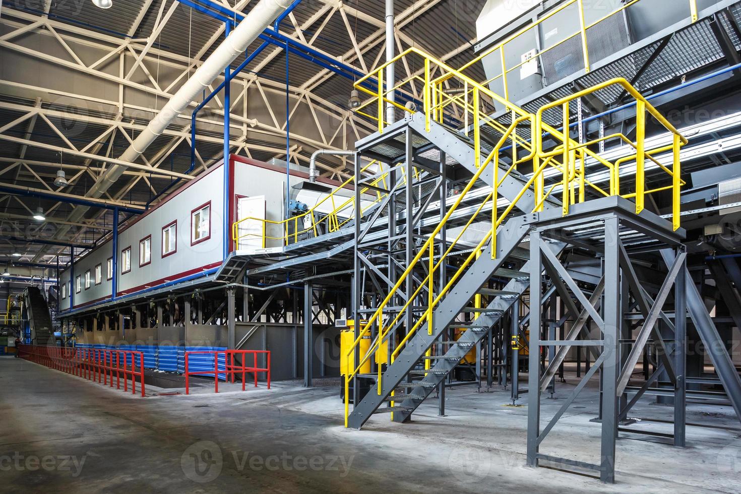 conveyor for manual sorting of garbage. Modern waste recycling processing plant. Separate garbage collection. Recycling and storage of waste for further disposal. photo