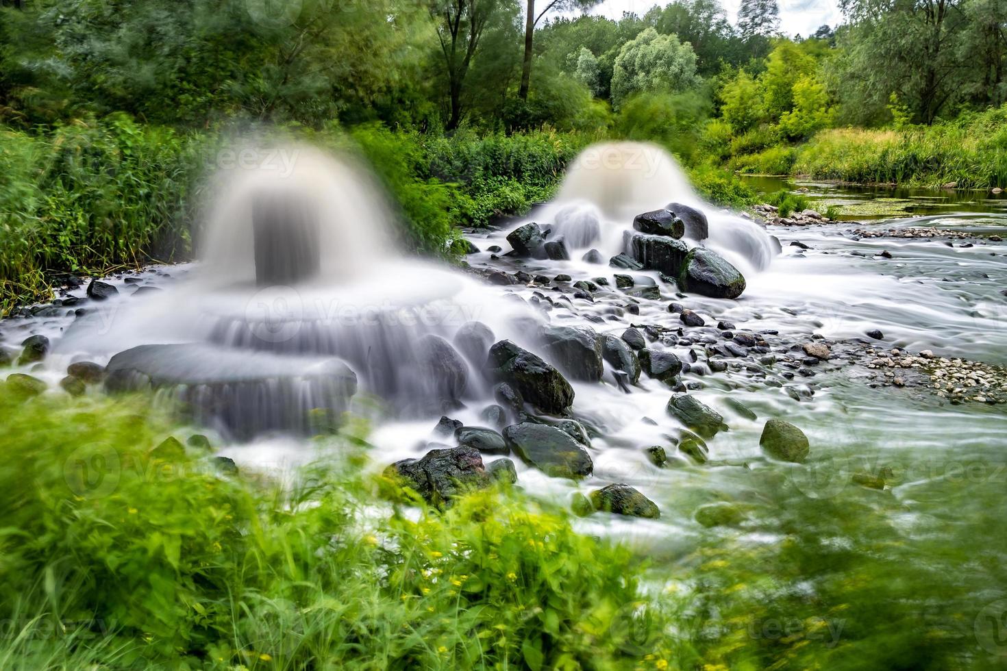 mixing zone of sewage discharge of urban sewage. river pollution. city dumps. long exposure photo