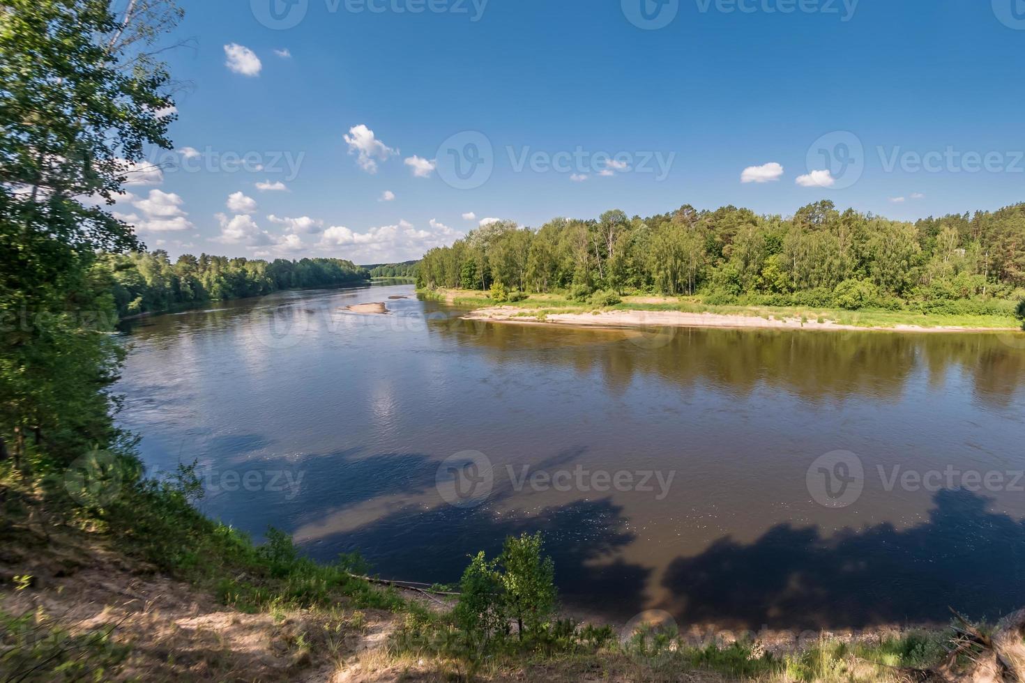 panorama of magnificent landscape of width river in forest photo