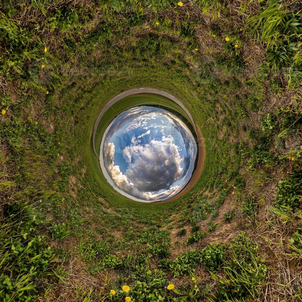 Blue little planet. Inversion of tiny planet transformation of spherical panorama 360 degrees. Spherical abstract aerial view. Curvature of space. photo