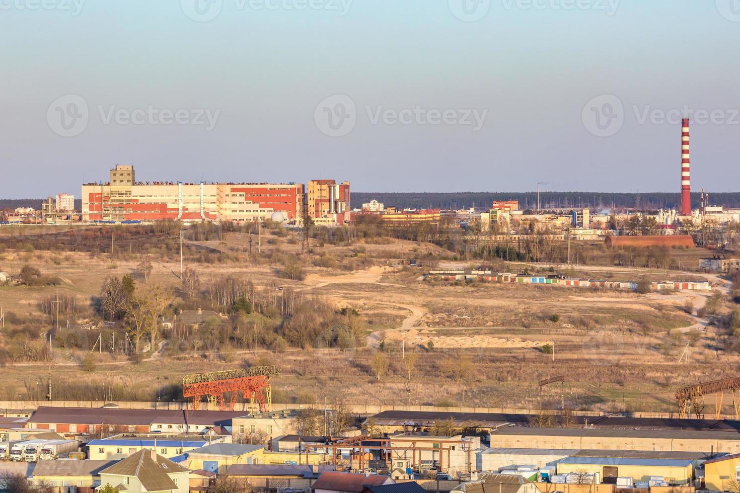 Panoramic view on village building area urban development residential quarter in the evening from a bird's eye view photo