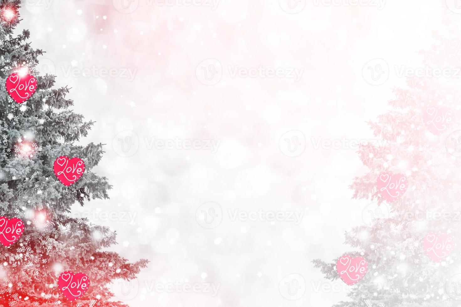 Frozen winter forest with snow covered trees. photo
