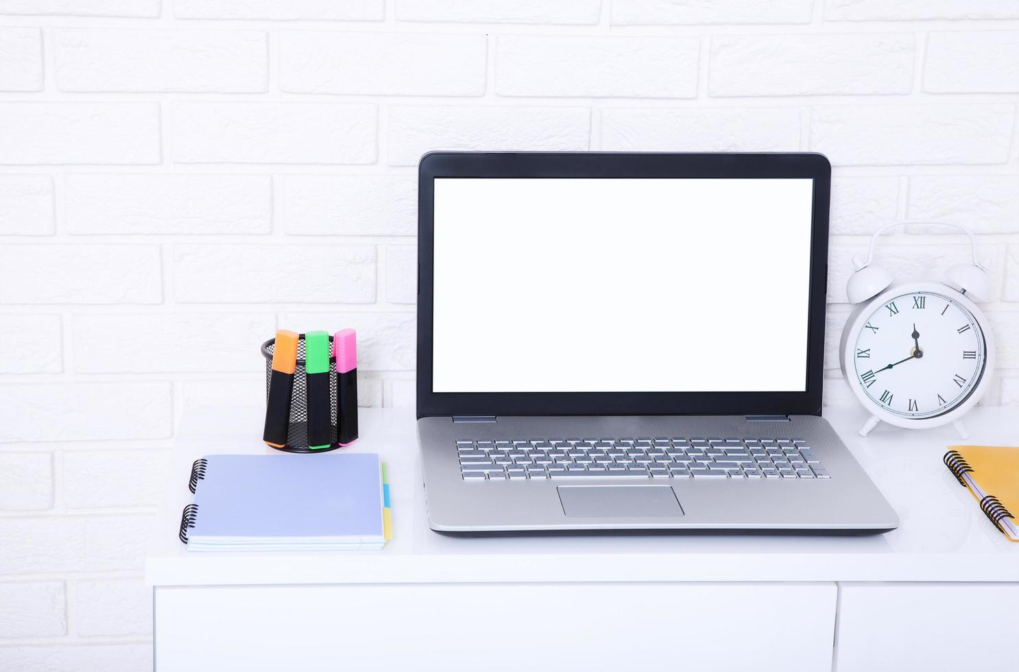 Workspace with laptop and other work accessories with copy space. Selective focus. Education photo