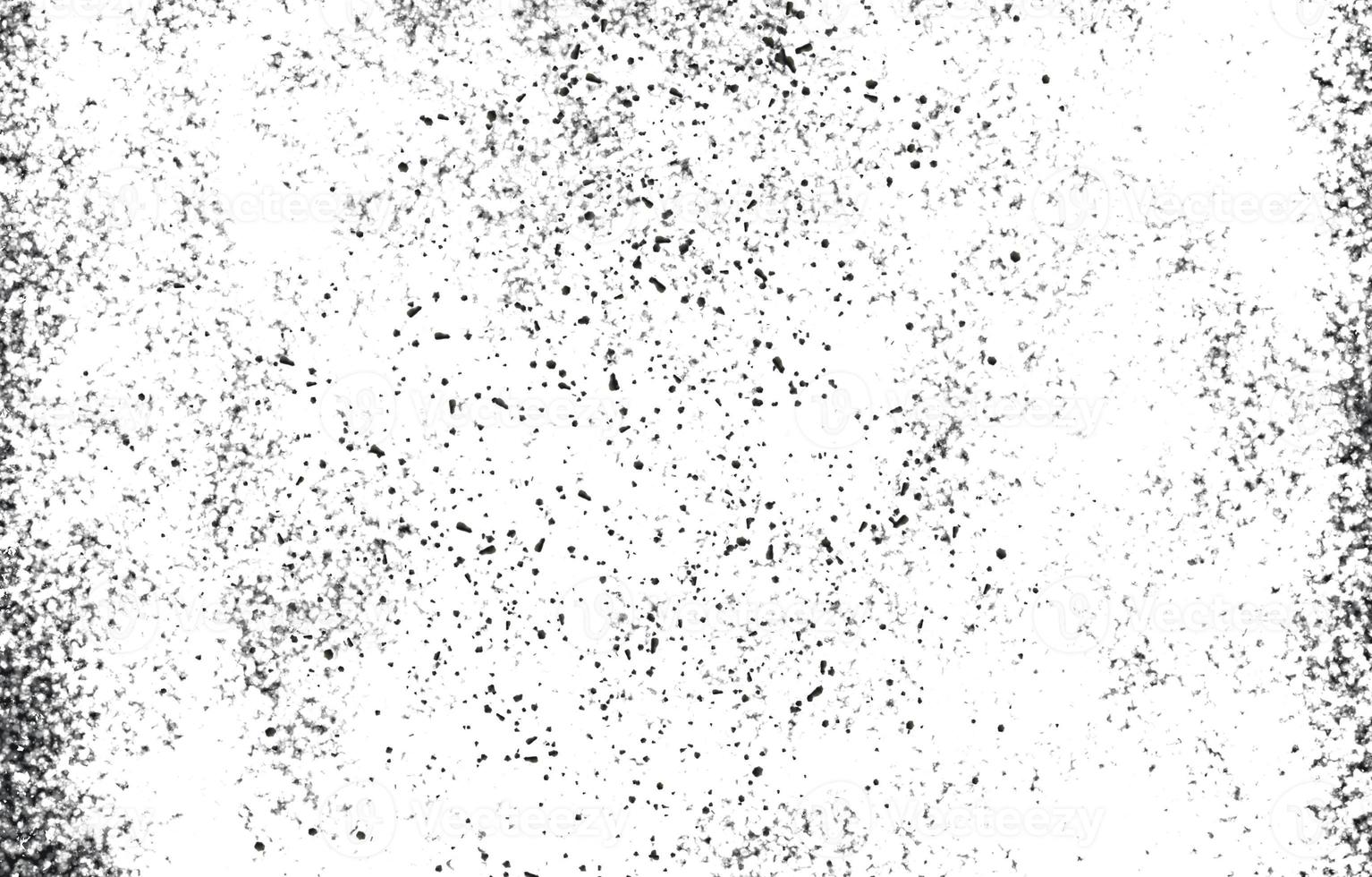 Monochrome particles abstract texture.Overlay illustration over any design to create grungy vintage effect and depth. photo