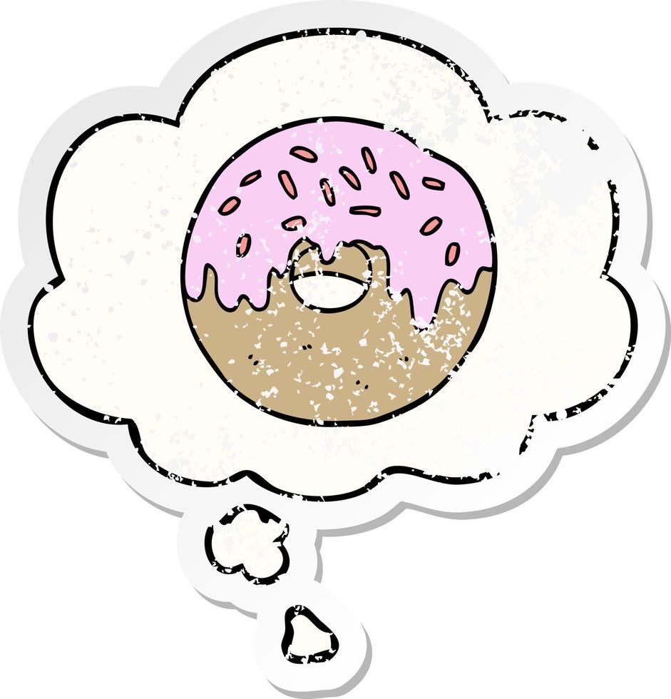 cartoon donut and thought bubble as a distressed worn sticker vector