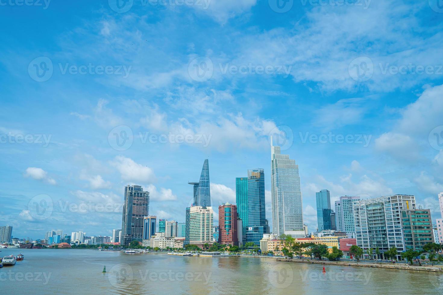 Ho Chi Minh City, VIETNAM - MAY 22 2022 Bitexco Financial Tower, skyscraper viewed from below toward a sky. Urban development with modern architecture photo