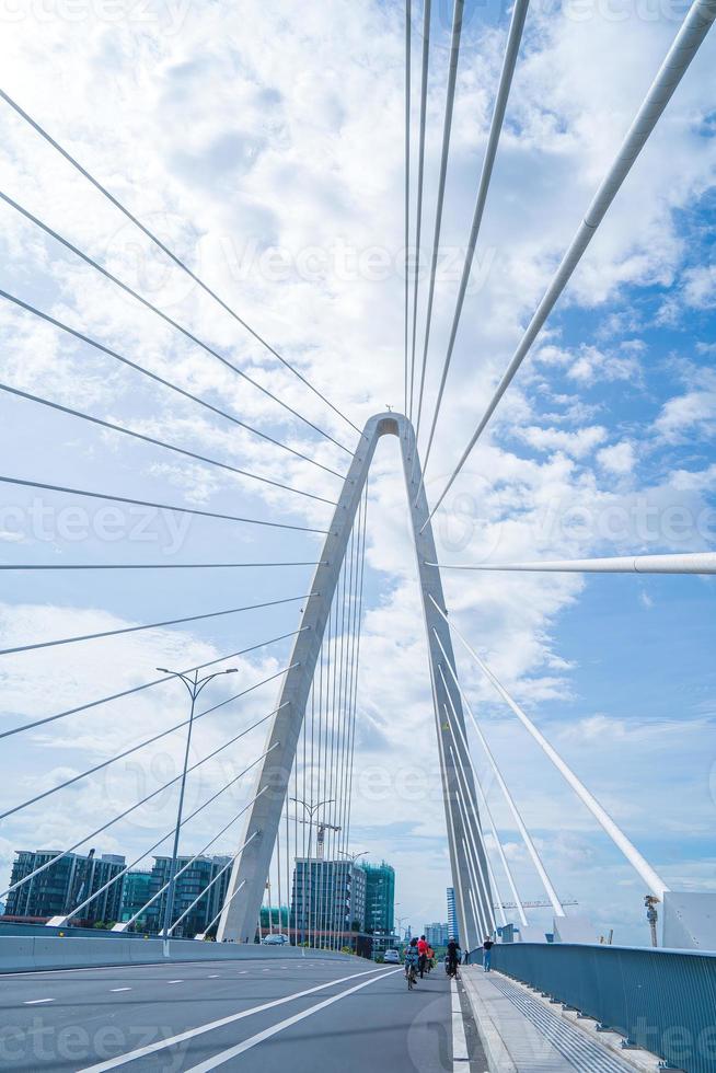 Ho Chi Minh city, Vietnam - MAY 22 2022 Thu Thiem 2 bridge, connecting Thu Thiem peninsula and District 1 across the Saigon River in Bach Dang port photo