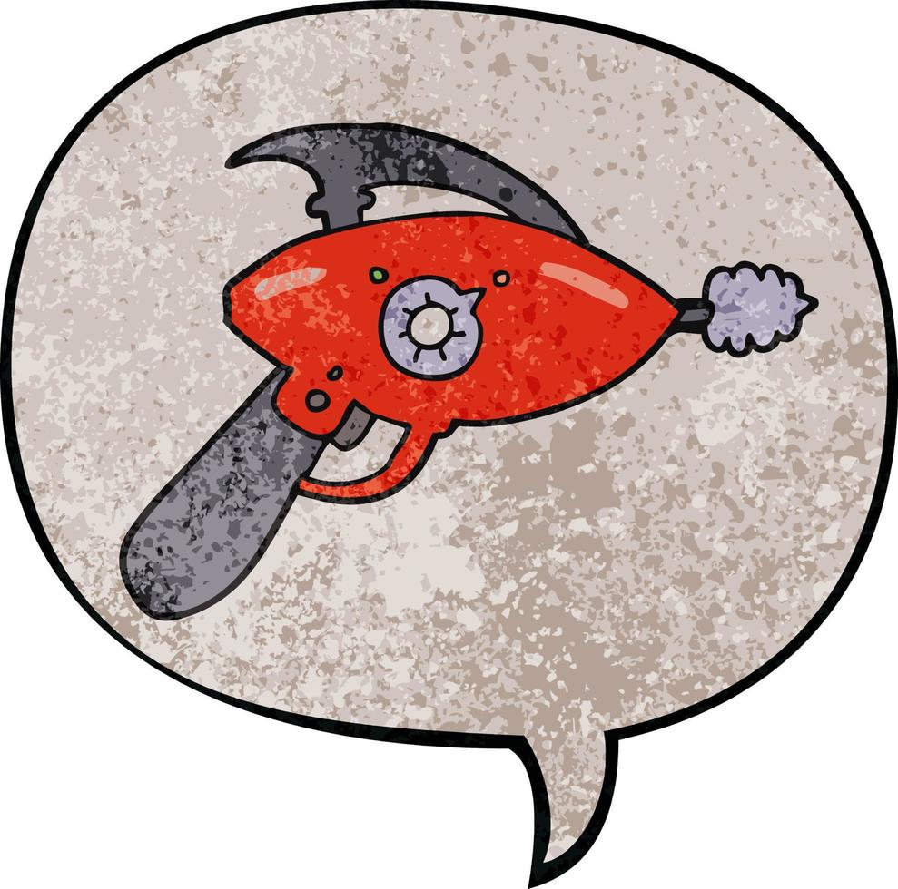 pistola de rayos de dibujos animados y burbuja de habla en estilo de textura retro vector