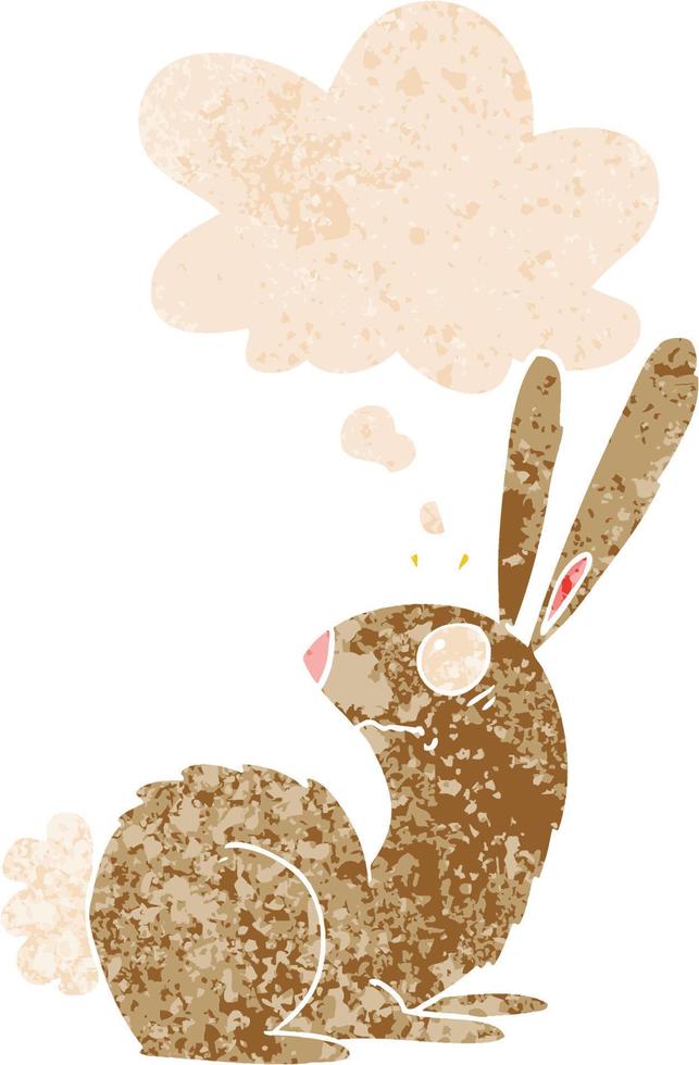 cartoon startled bunny rabbit and thought bubble in retro textured style vector