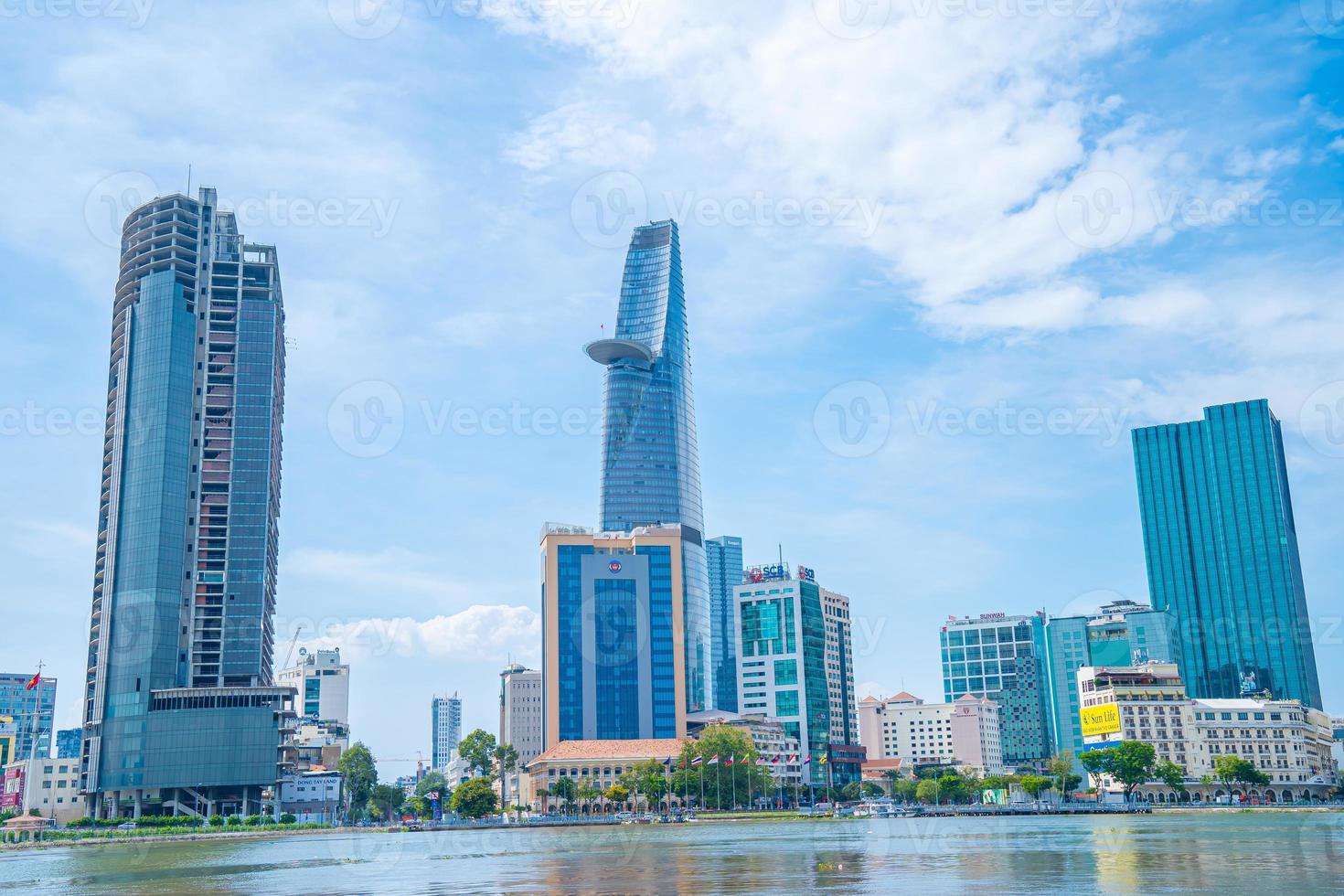 Ho Chi Minh City, VIETNAM - FEB 12 2022 Bitexco Financial Tower, skyscraper viewed from below toward a sky. Urban development with modern architecture photo