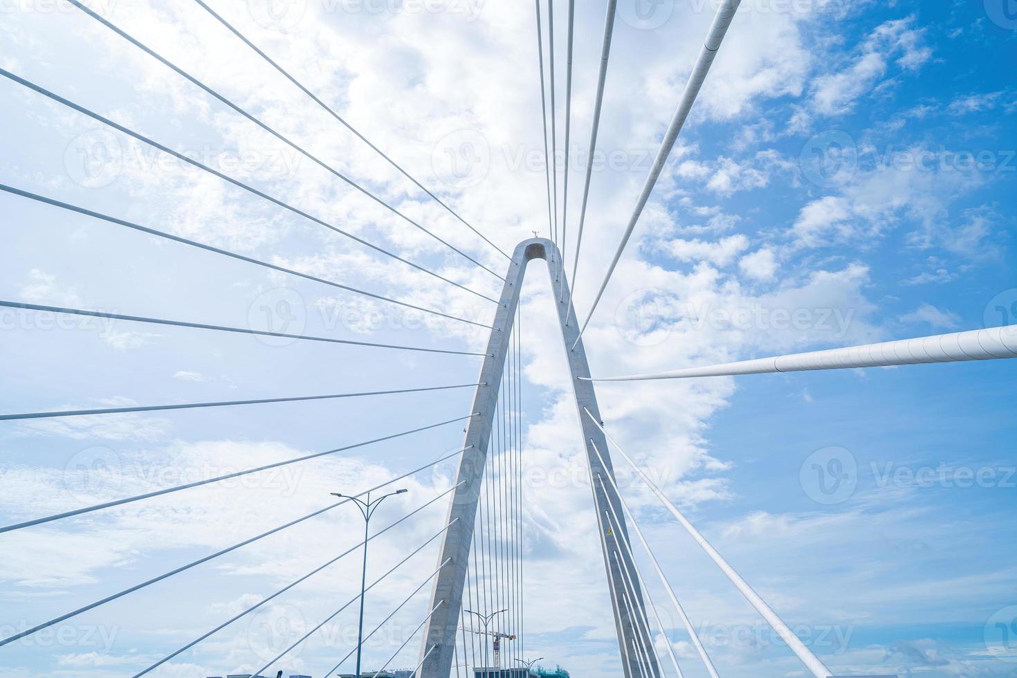 Ho Chi Minh city, Vietnam - MAY 22 2022 Thu Thiem 2 bridge, connecting Thu Thiem peninsula and District 1 across the Saigon River in Bach Dang port photo