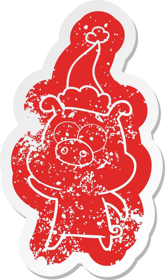 happy cartoon distressed sticker of a pig wearing santa hat vector
