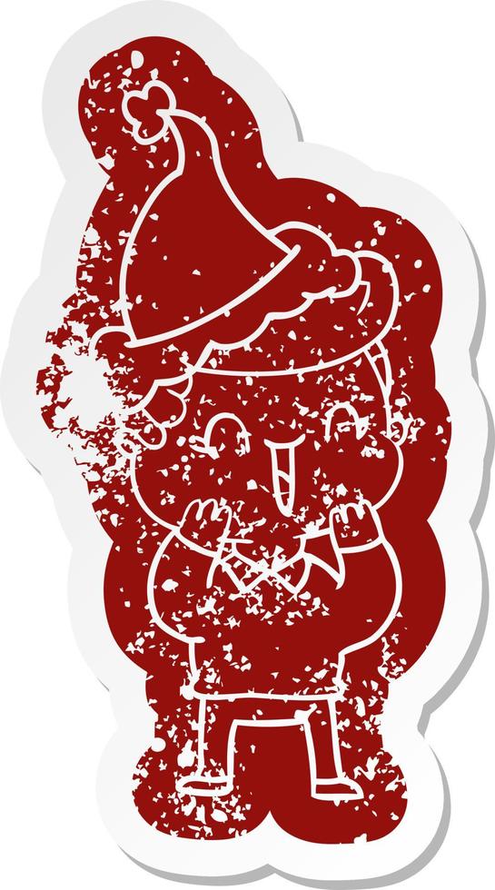 cartoon distressed sticker of a laughing boy wearing santa hat vector