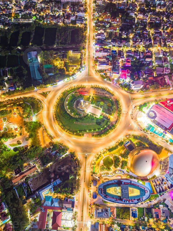 Vung Tau view from above, with traffic roundabout, house, Vietnam war memorial in Vietnam. Long exposure photography at night. photo