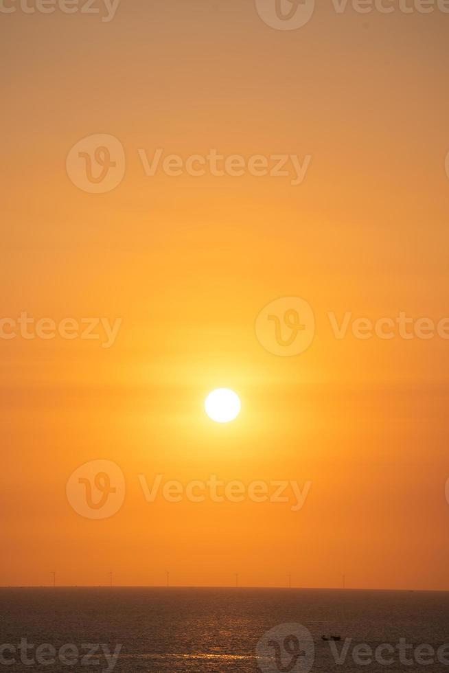 Beautiful sunset beach landscape, exotic tropical island nature, colorful red yellow sky, silhouette ship, golden sun glow reflection, summer holidays vacation. Sky cloud cinematic. photo