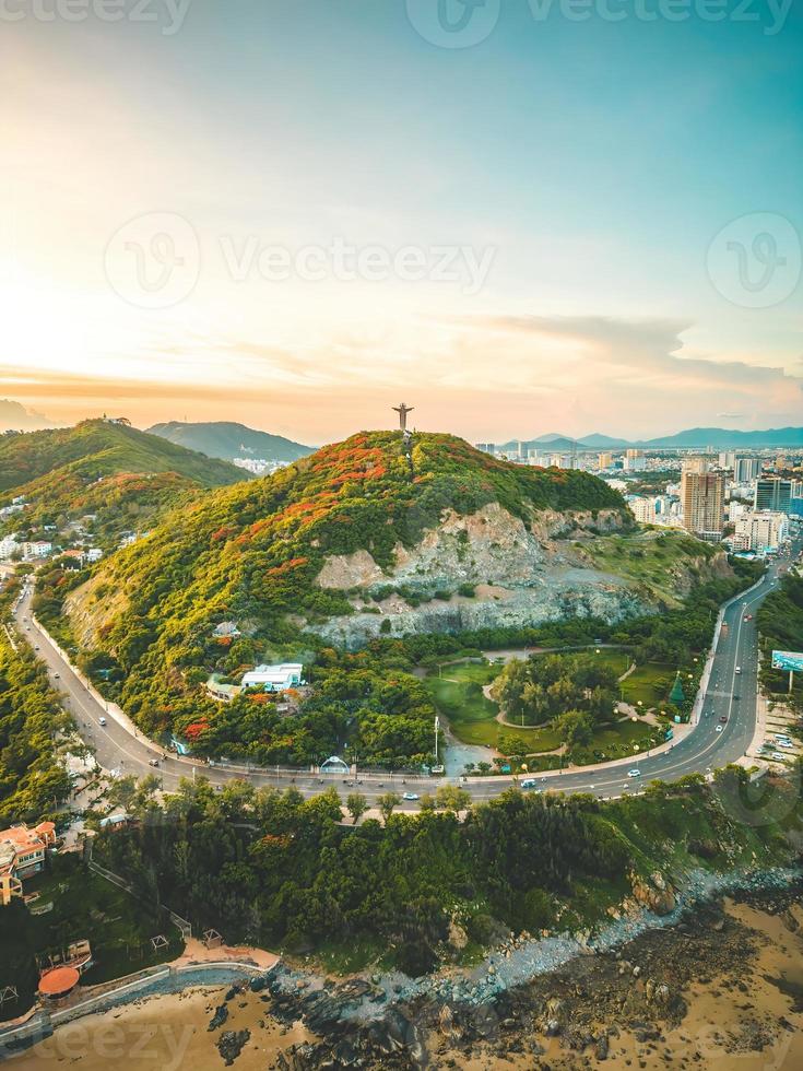 Top view of Vung Tau with statue of Jesus Christ on Mountain . the most popular local place. Christ the King, a statue of Jesus. Travel concept. photo