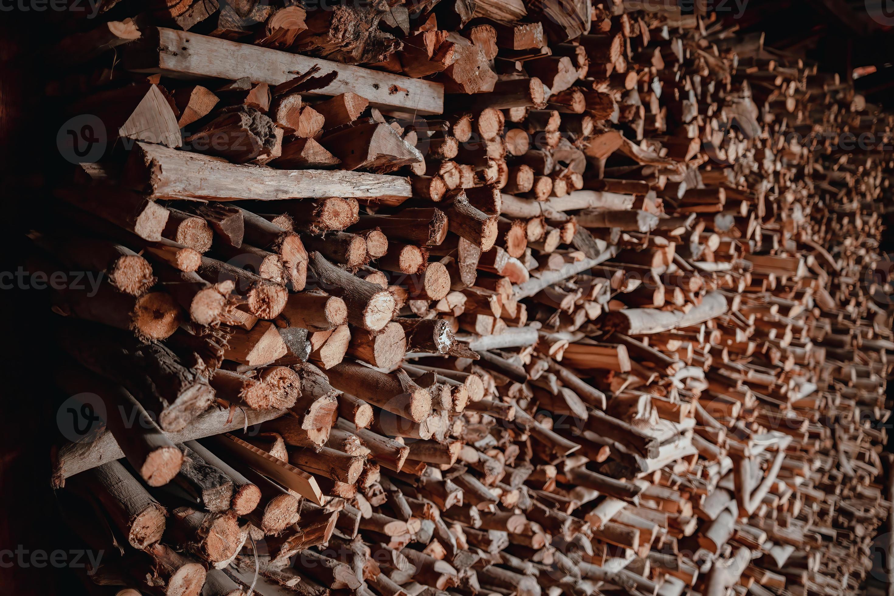 Woodpile fresh cut pine logs at sawmill factory. Big stack of tree trunks  at wood production lumber mill. Processing timber material at wood  construction warehouse. Chopped firewood stumps. Forestry 10044984 Stock  Photo