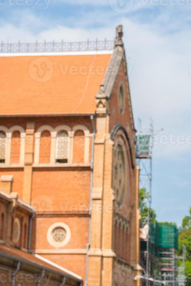 Focus Saigon Notre-Dame Cathedral Basilica, Basilica of Our Lady of The Immaculate Conception in Ho Chi Minh City, Saigon, Vietnam under renovation with blue sky background. photo