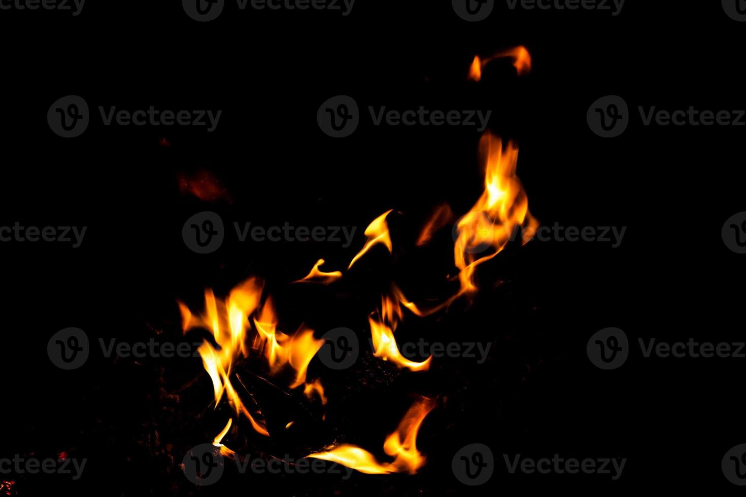 Fire flame texture. Burning material backdrop. Burn effect pattern. Blaze and torch wallpaper. Heat and haze backdrop. photo