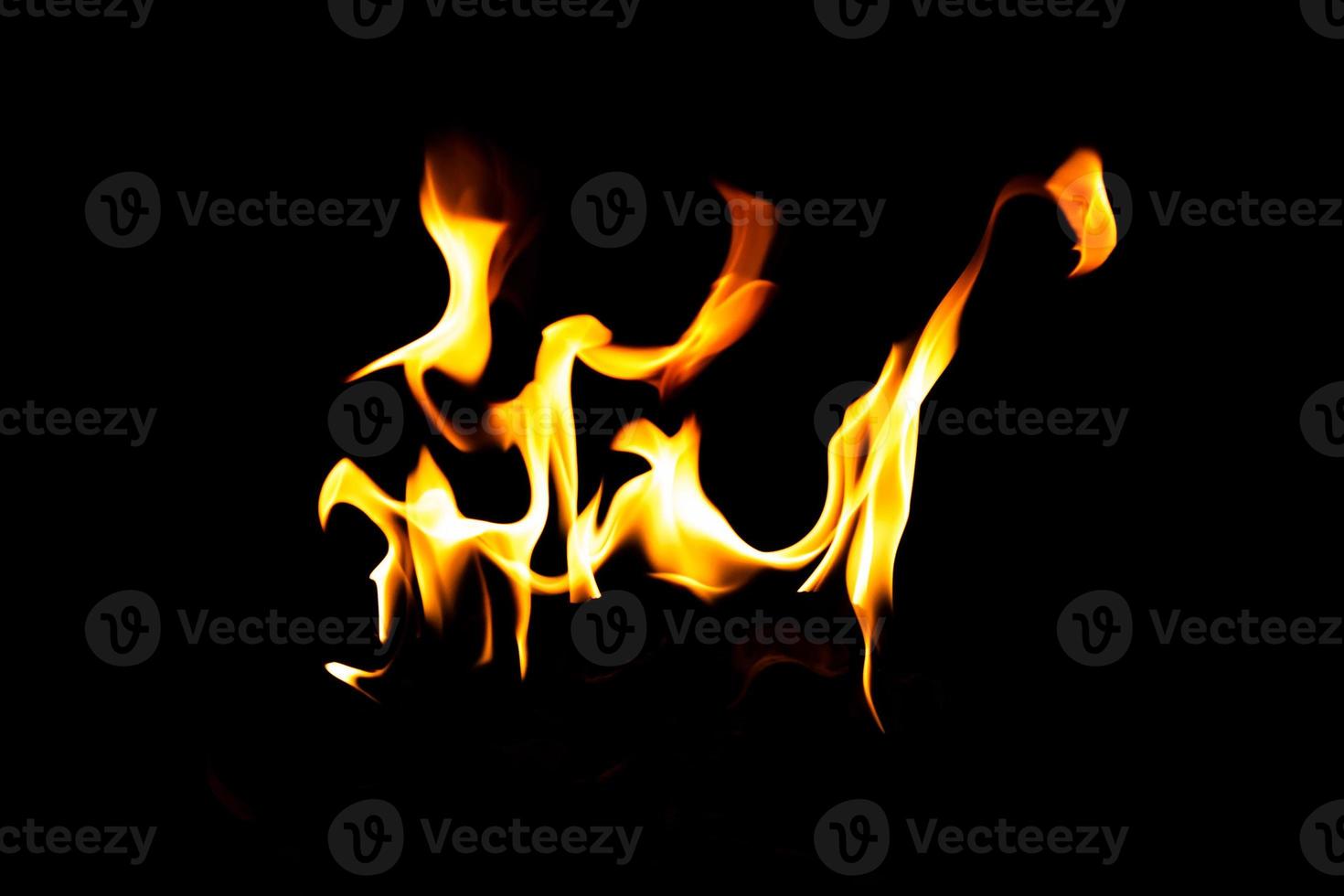 Fire flame texture. Burning material backdrop. Burn effect pattern. Blaze and torch wallpaper. Heat and haze backdrop. photo