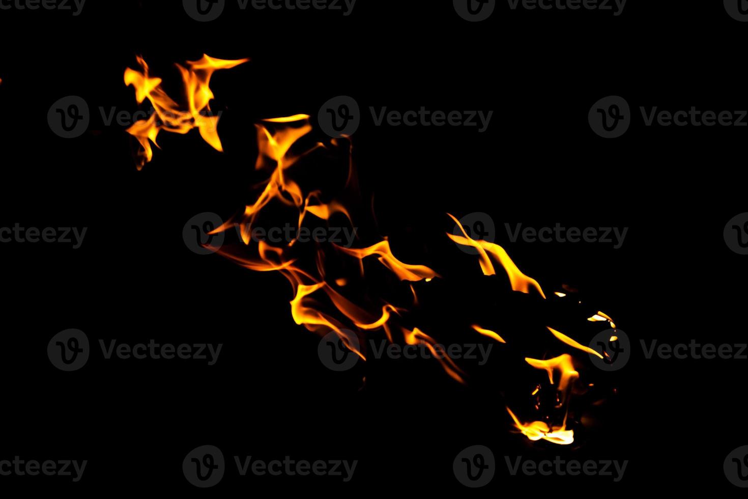 Fire flame texture. Burning material backdrop. Burn effect pattern. Blaze and torch wallpaper. Heat and haze backdrop. photo