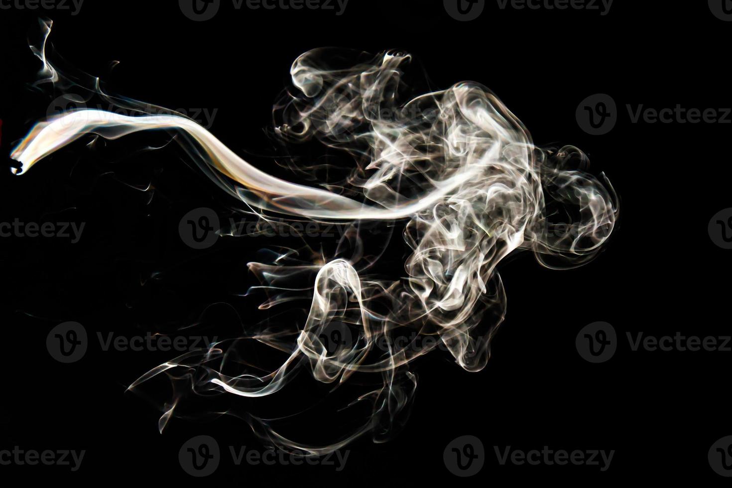 Smoke effect texture. Isolated background. Black and dark backdrop. Smokey fire and mistic effect. photo