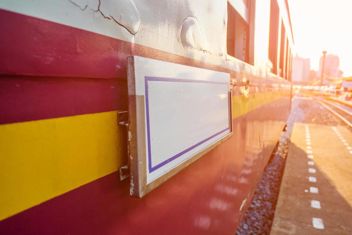 Close up Destination label on Retro train in the morning photo