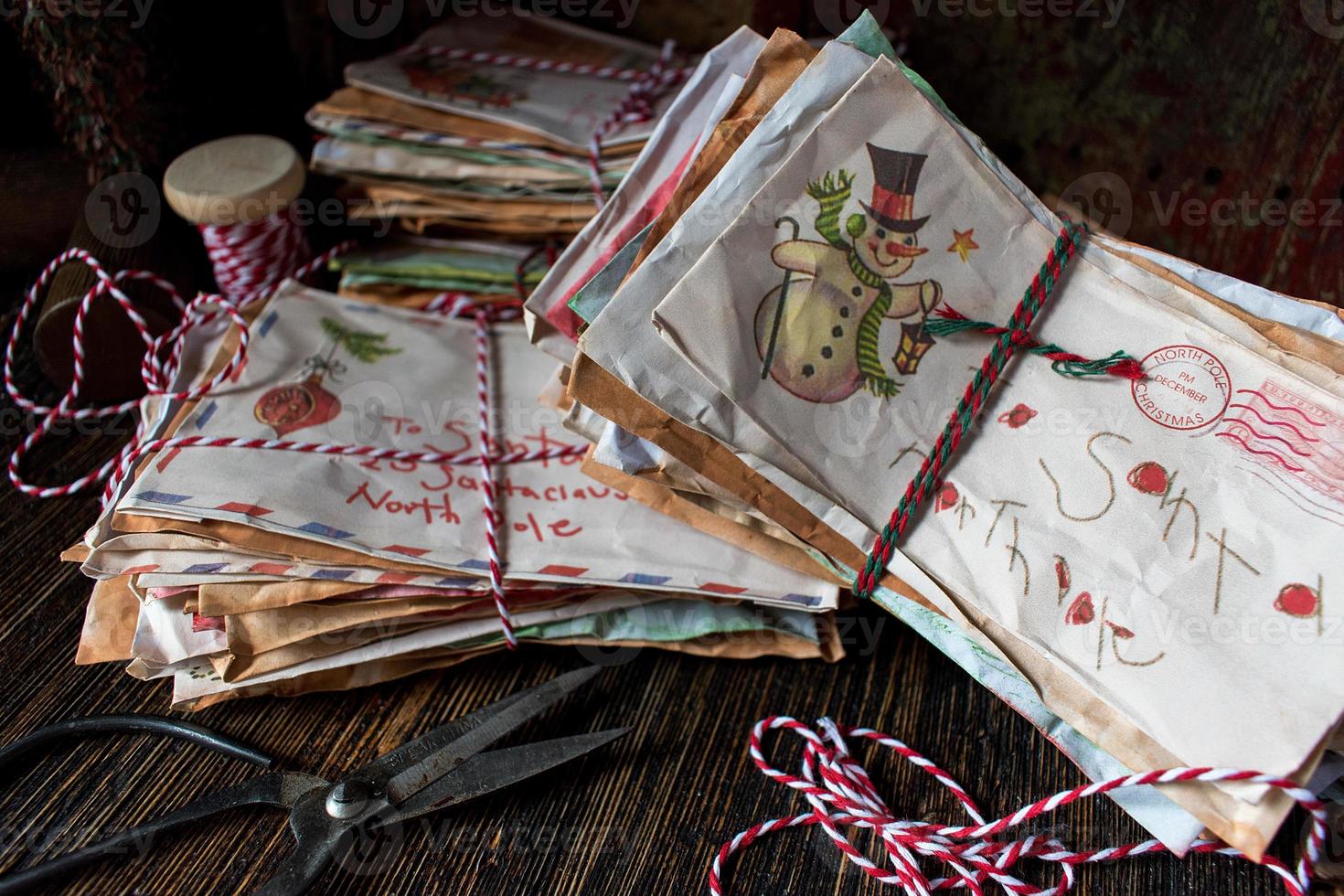 Christmas letters to Santa Claus wrapped in string photo