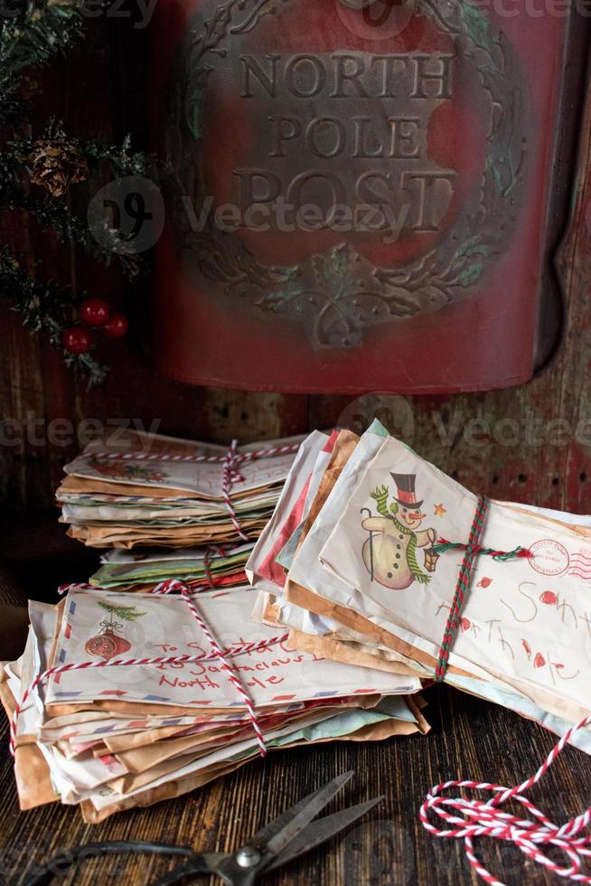 Christmas letters to Santa Claus wrapped in string photo