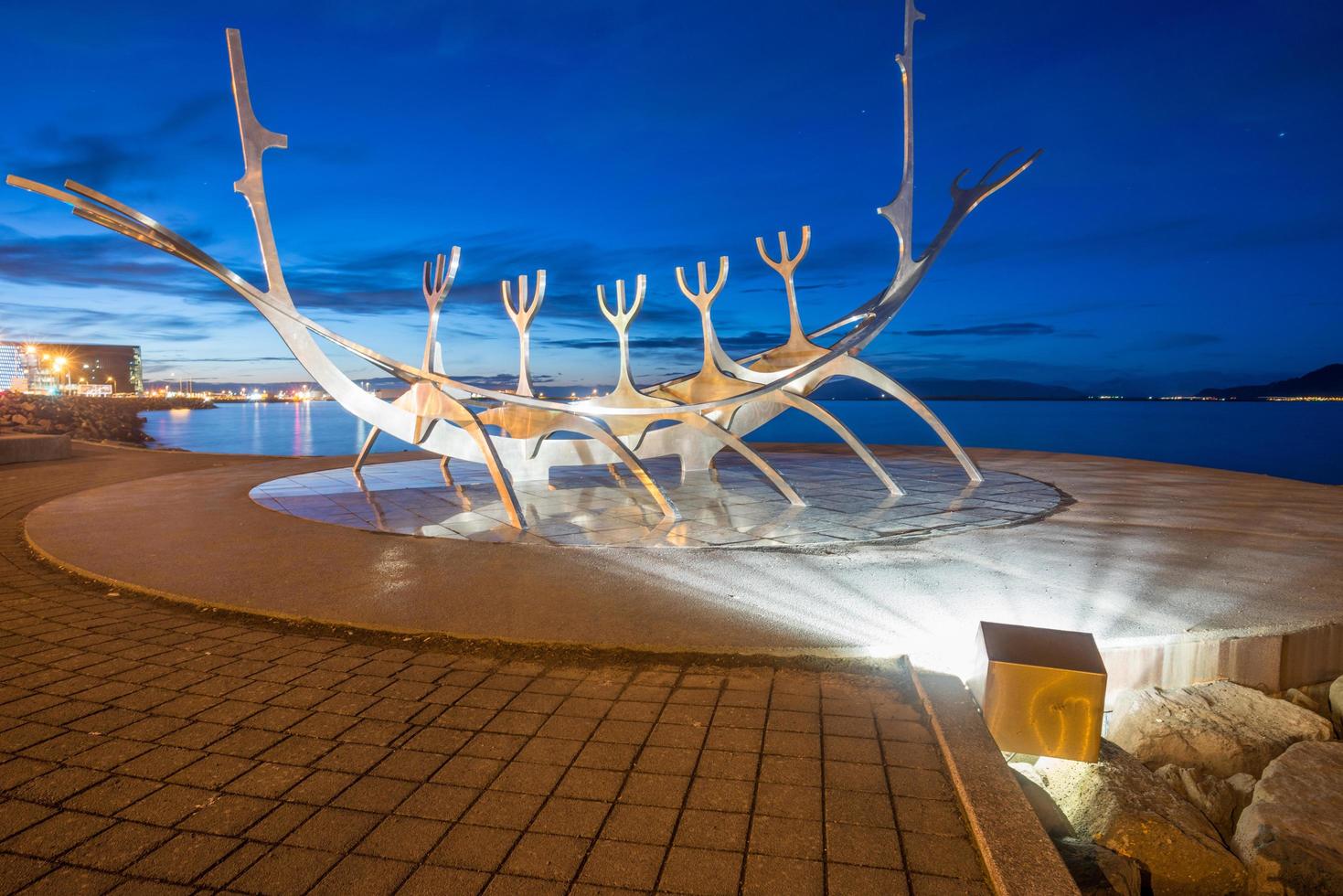 Reykjavik, Iceland - March 27 2016 - The Sun voyager one of the Icelandic famous sculpture in Reykjavik the capital city of Iceland at night. photo