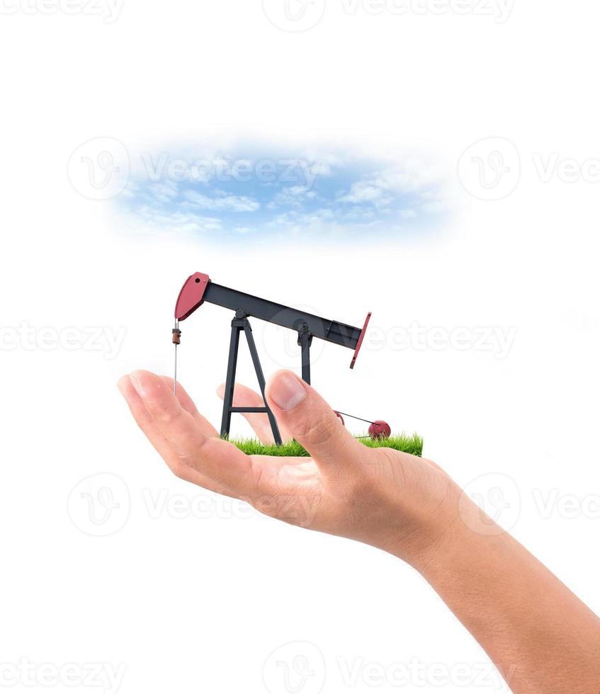 hand hold pumpjack photo