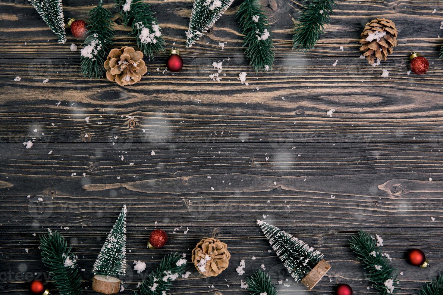 Christmas holiday composition decoration on wooden background, new year and xmas or anniversary with presents on wood table in season, top view or flat lay. photo
