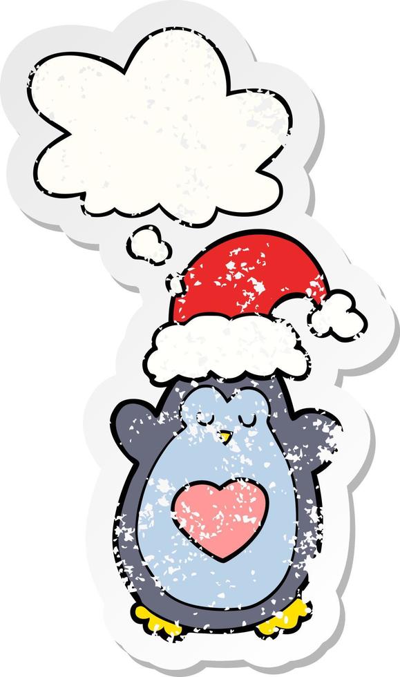 cute christmas penguin and thought bubble as a distressed worn sticker vector