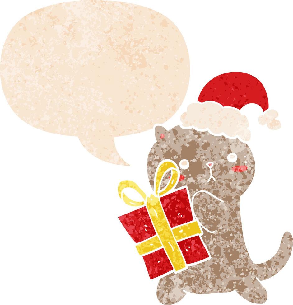 cute cartoon cat carrying christmas present and speech bubble in retro textured style vector