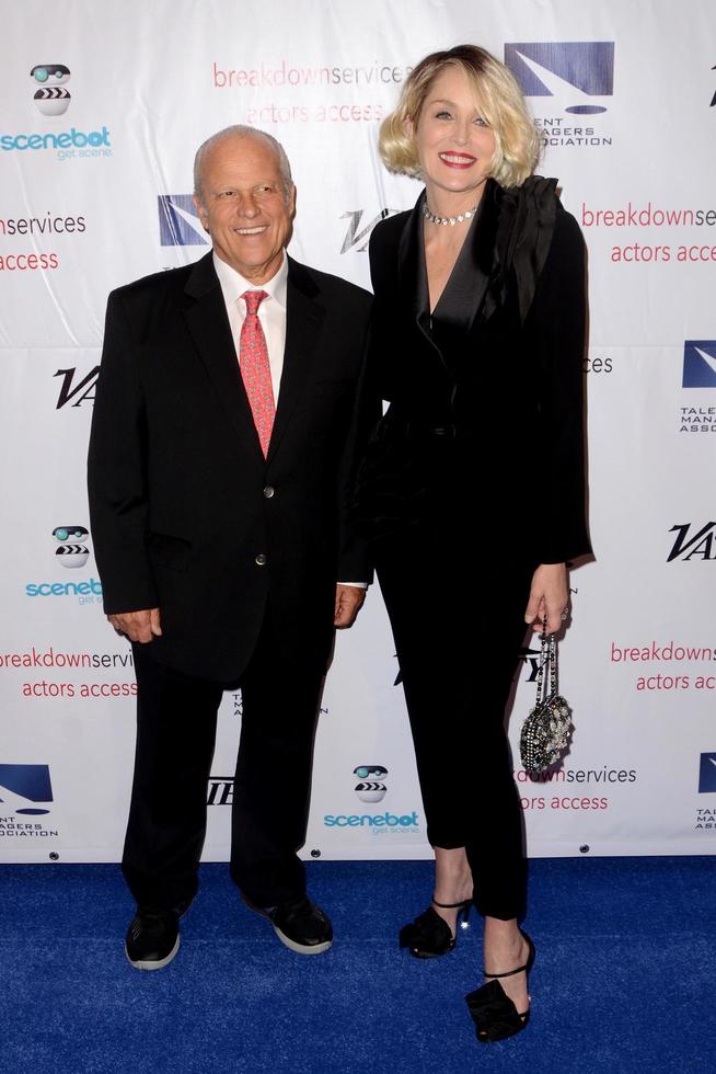 LOS ANGELES, NOV 10 - Chuck Binder, Sharon Stone at the 2016 TMA Heller Awards at Beverly Hilton Hotel on November 10, 2016 in Beverly Hills, CA photo