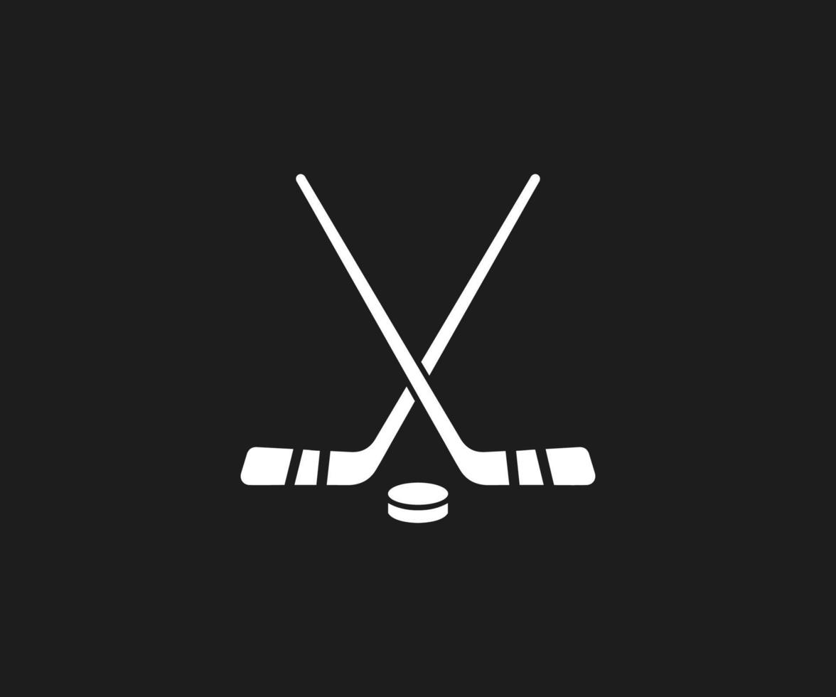 icono de palos de hockey y disco vector