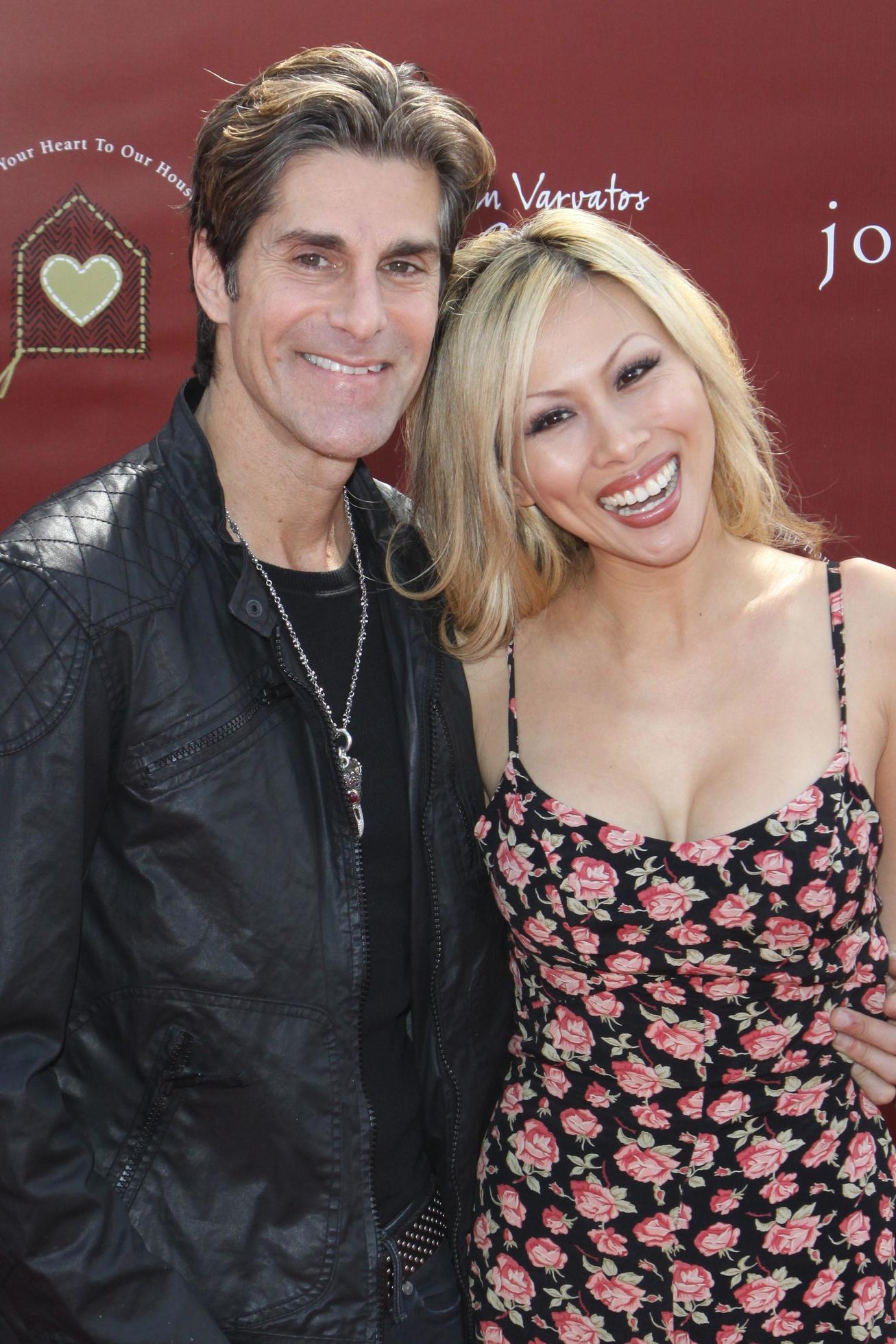 LOS ANGELES, MAR 13 - Perry Farrell, Etty Lau Farrell arriving at the
