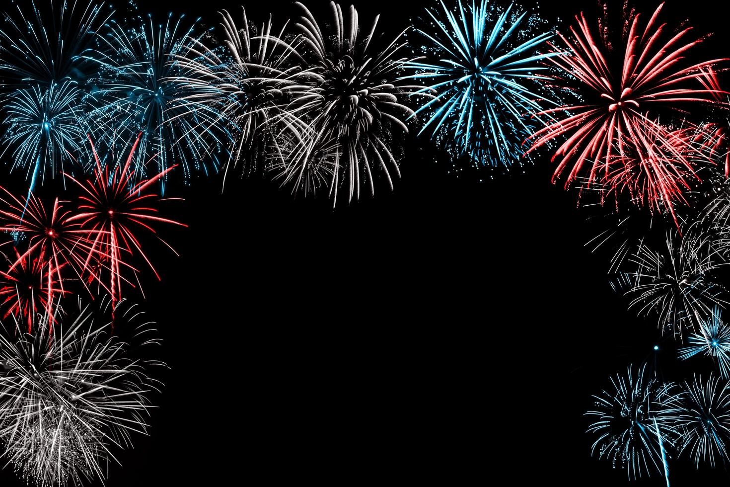 Red and Blue Firework in black background photo