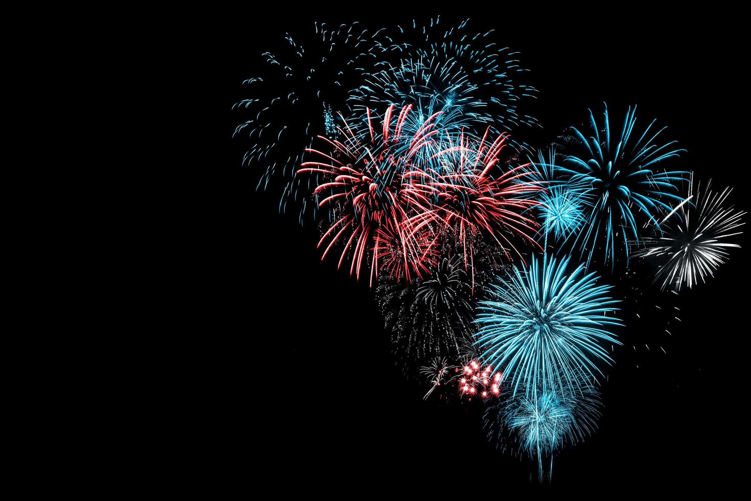 Red and Blue Firework in black background photo