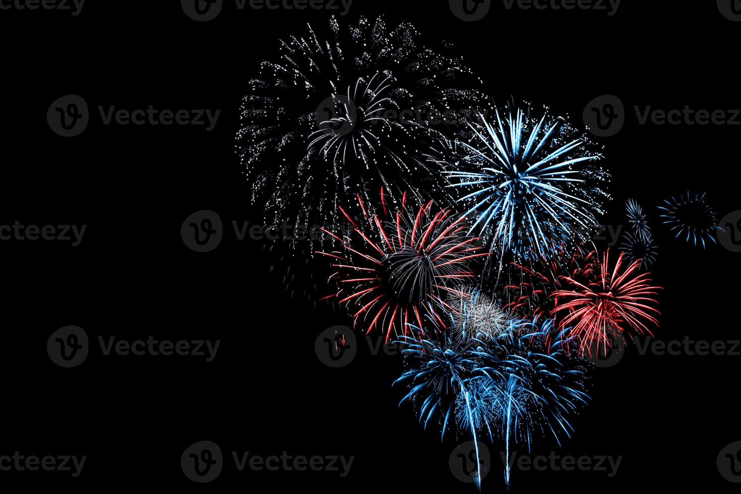 Red and Blue Firework in black background photo