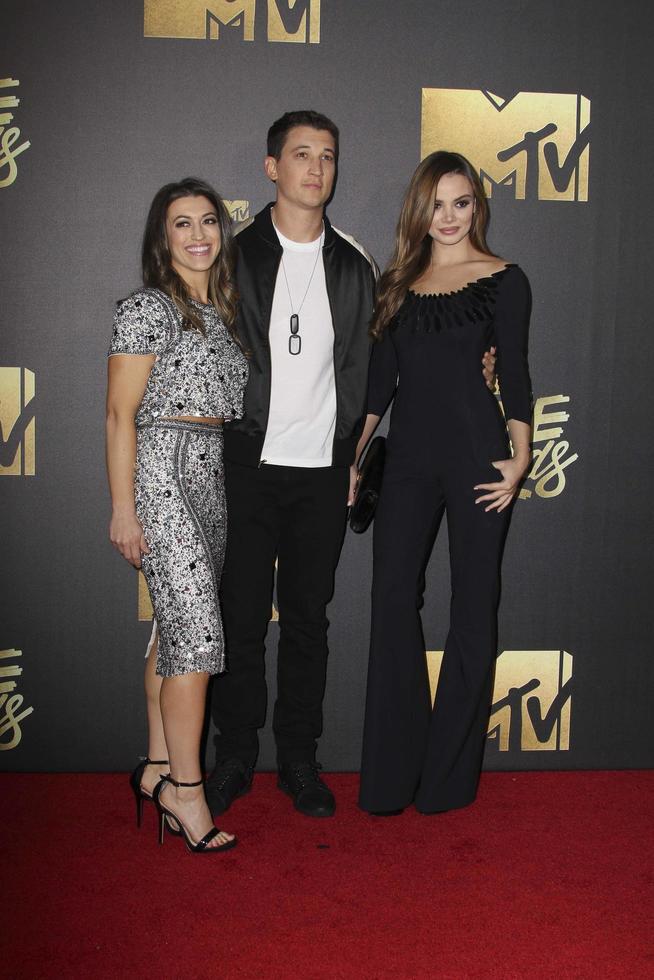 LOS ANGELES, APR 9 - Dana Teller, Miles Teller, Kaleigh Sperry at the 2016 MTV Movie Awards Arrivals at the Warner Brothers Studio on April 9, 2016 in Burbank, CA photo