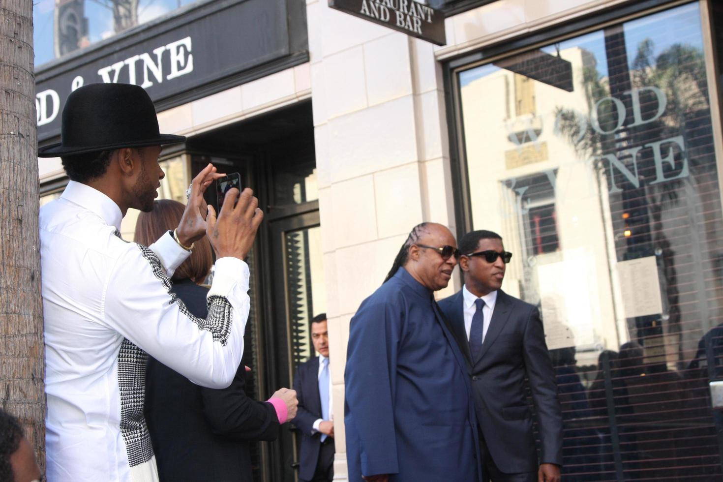 LOS ANGELES, OCT 10 - Usher, Stevie Wonder, Kenny Babyface Edmonds at the Kenny Babyface Edmonds Hollywood Walk of Fame Star Ceremony at Hollywood Boulevard on October 10, 2013 in Los Angeles, CA photo