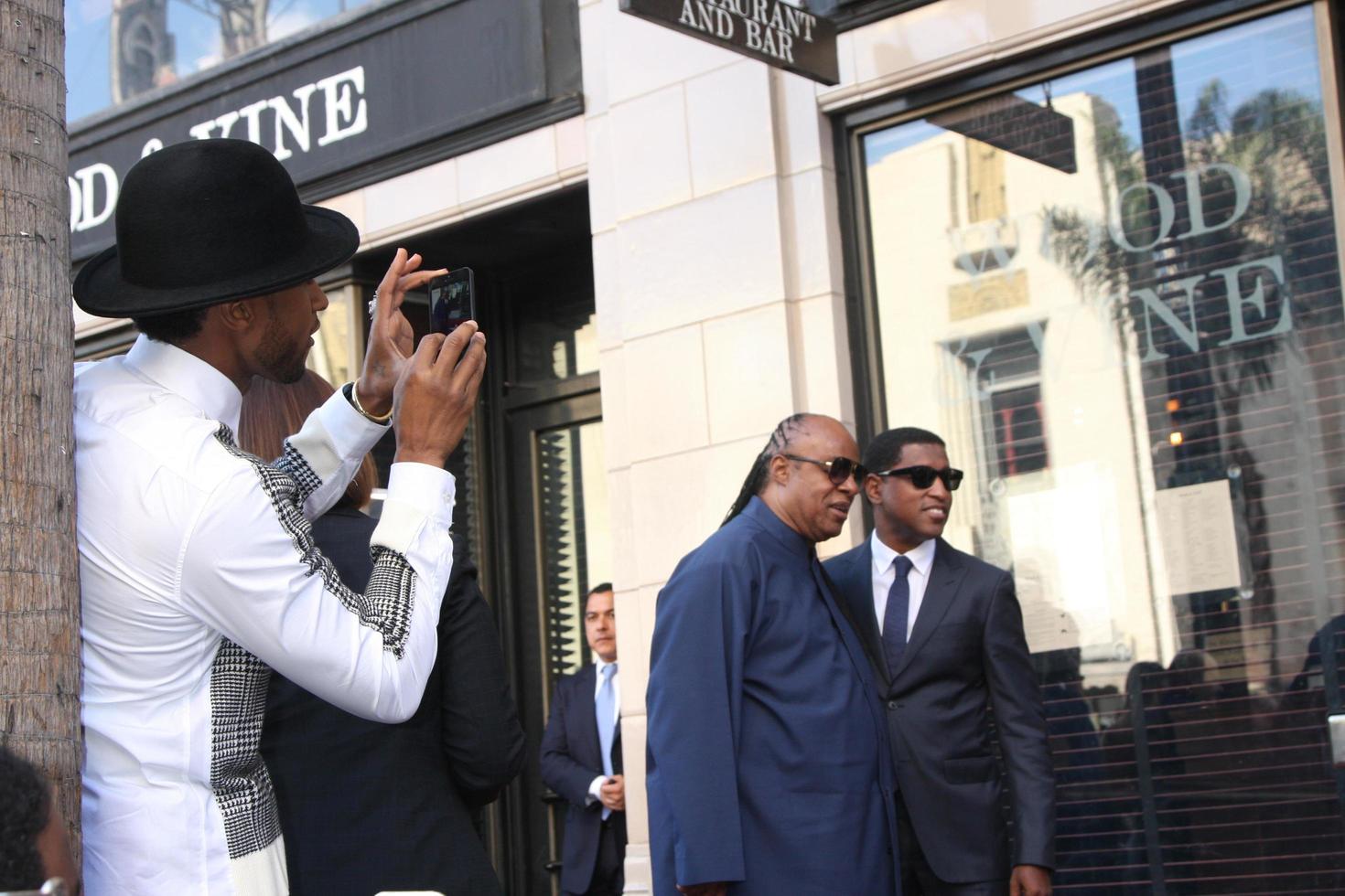 LOS ANGELES, OCT 10 - Usher, Stevie Wonder, Kenny Babyface Edmonds at the Kenny Babyface Edmonds Hollywood Walk of Fame Star Ceremony at Hollywood Boulevard on October 10, 2013 in Los Angeles, CA photo