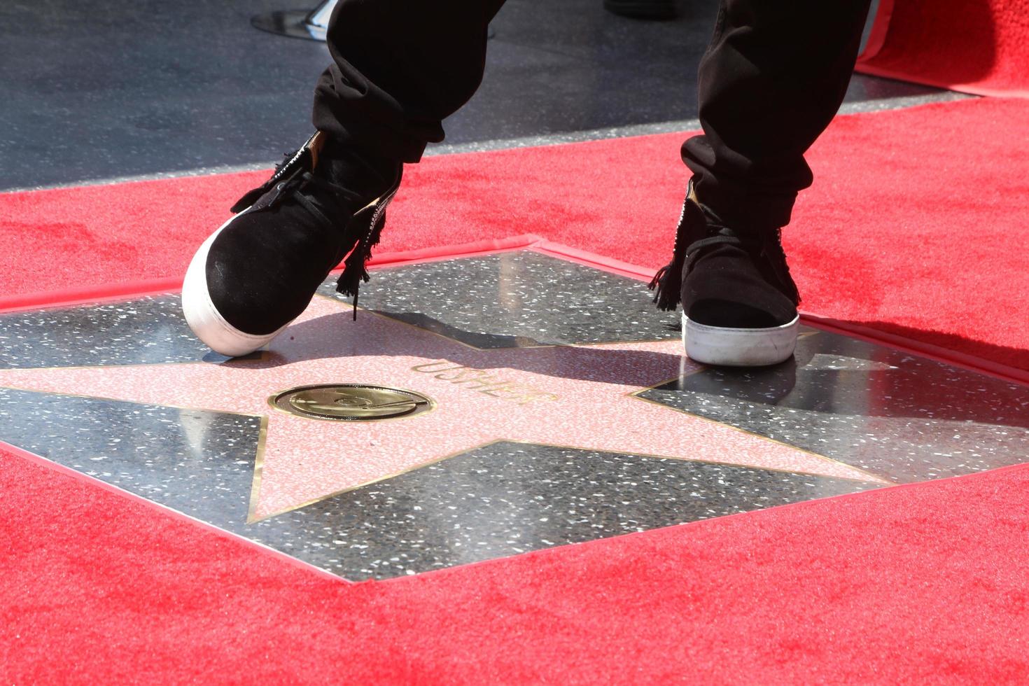 LOS ANGELES, SEP 7 - Usher Raymond at the Usher Honored With a Star On The Hollywood Walk Of Fame at the Eastown on September 7, 2016 in Los Angeles, CA photo